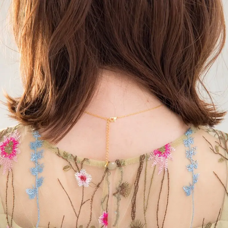 花柄マキシドレスクリーニング済21000円さらに値下げイヤリング、ネックレス付き ゴールドのカーブクリスタルネックレス | リボン | D-6025 | 結婚式