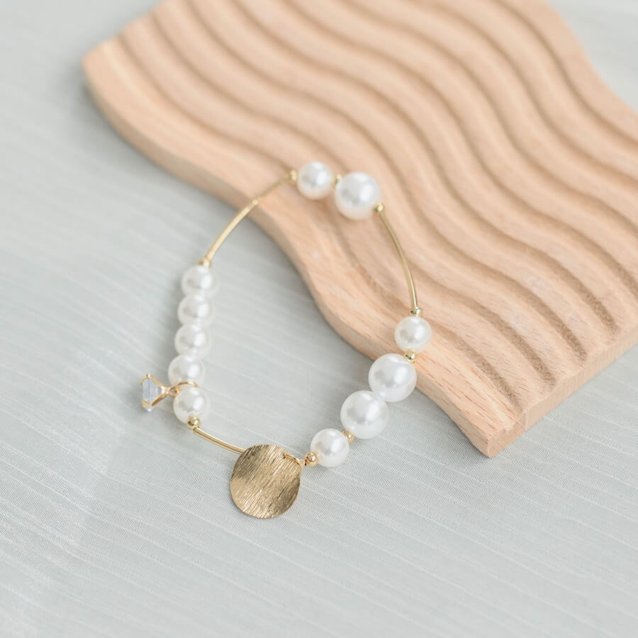 ゴールドのパール×ゴールドチャームブレスレットの商品画像1