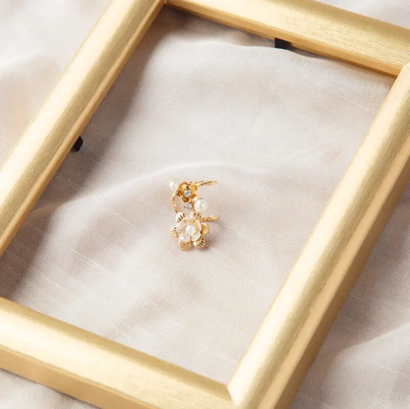 ゴールドのフラワーラインイヤーカフ | シルバー商会 | I-0041 | 結婚